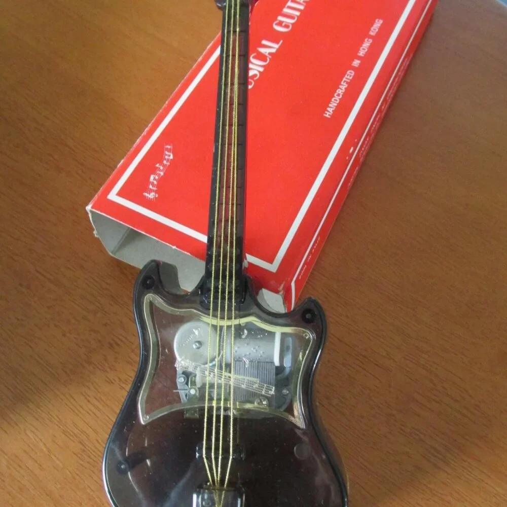 Musical wind key guitar/table top - Picture 1 of 3